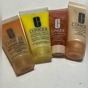 Clinique 4 Pc Skincare Makeup Travel Gift Set Plum Pop Moisture Surge & more